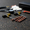 Imagen de Kit Reparacion Pinchazos Con Llave Y Tarugos-10 Piezas. Negro